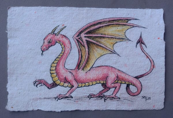 tekening van een rode draak op handgeschept papier